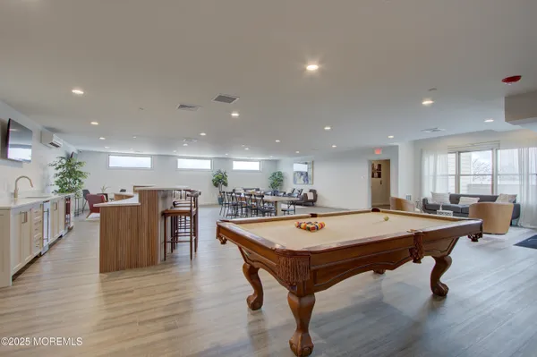 a kitchen with a table and chairs in it