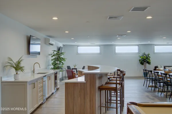 a bathroom with a toilet sink and shower