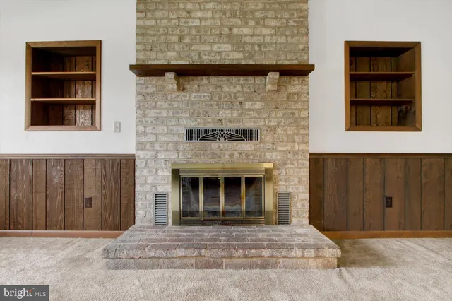 a living room with a fireplace