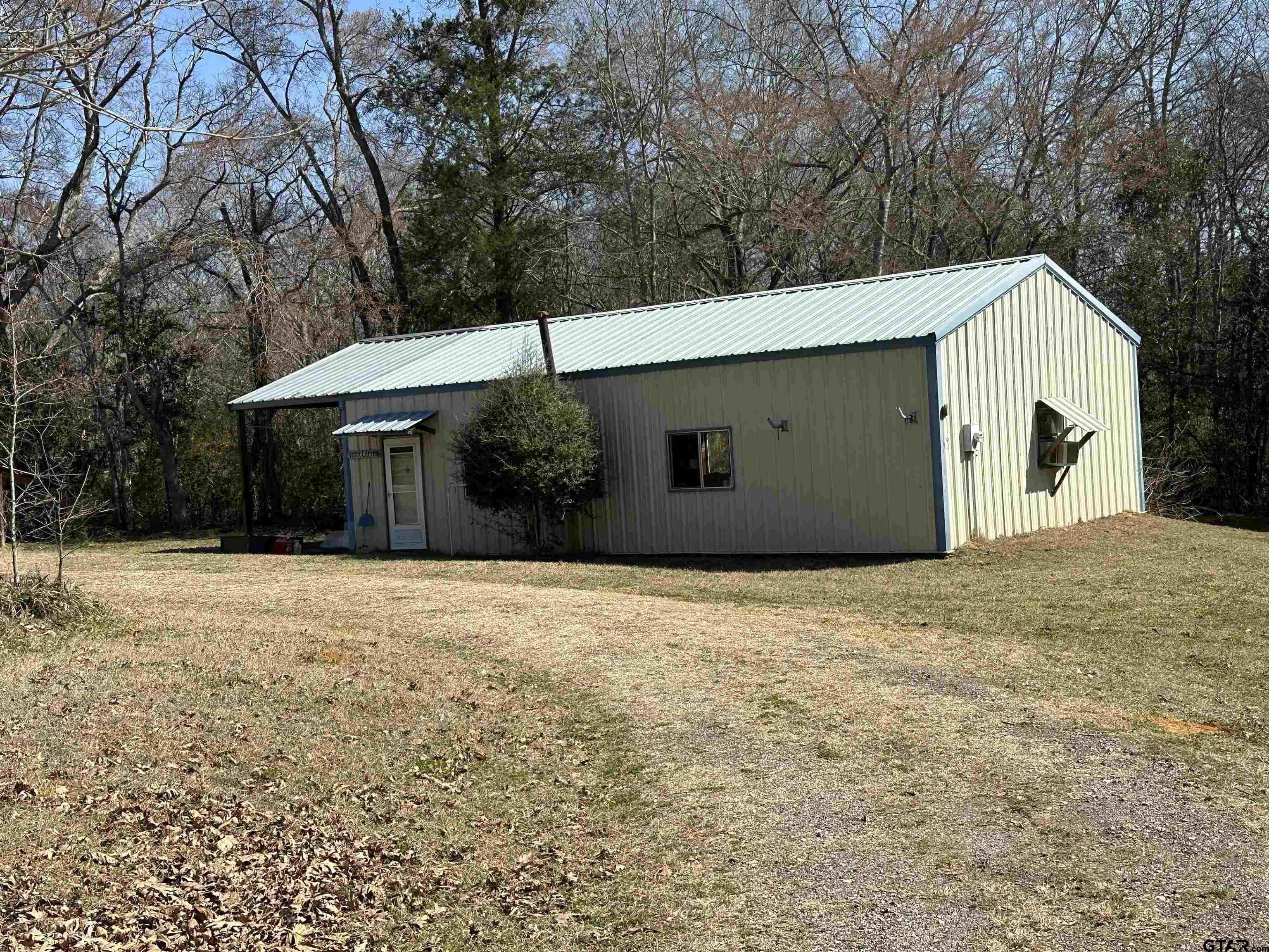 957 Farm To Market 23 Rusk, TX 75785 - Photo 3 of 25 a view of a house with a yard