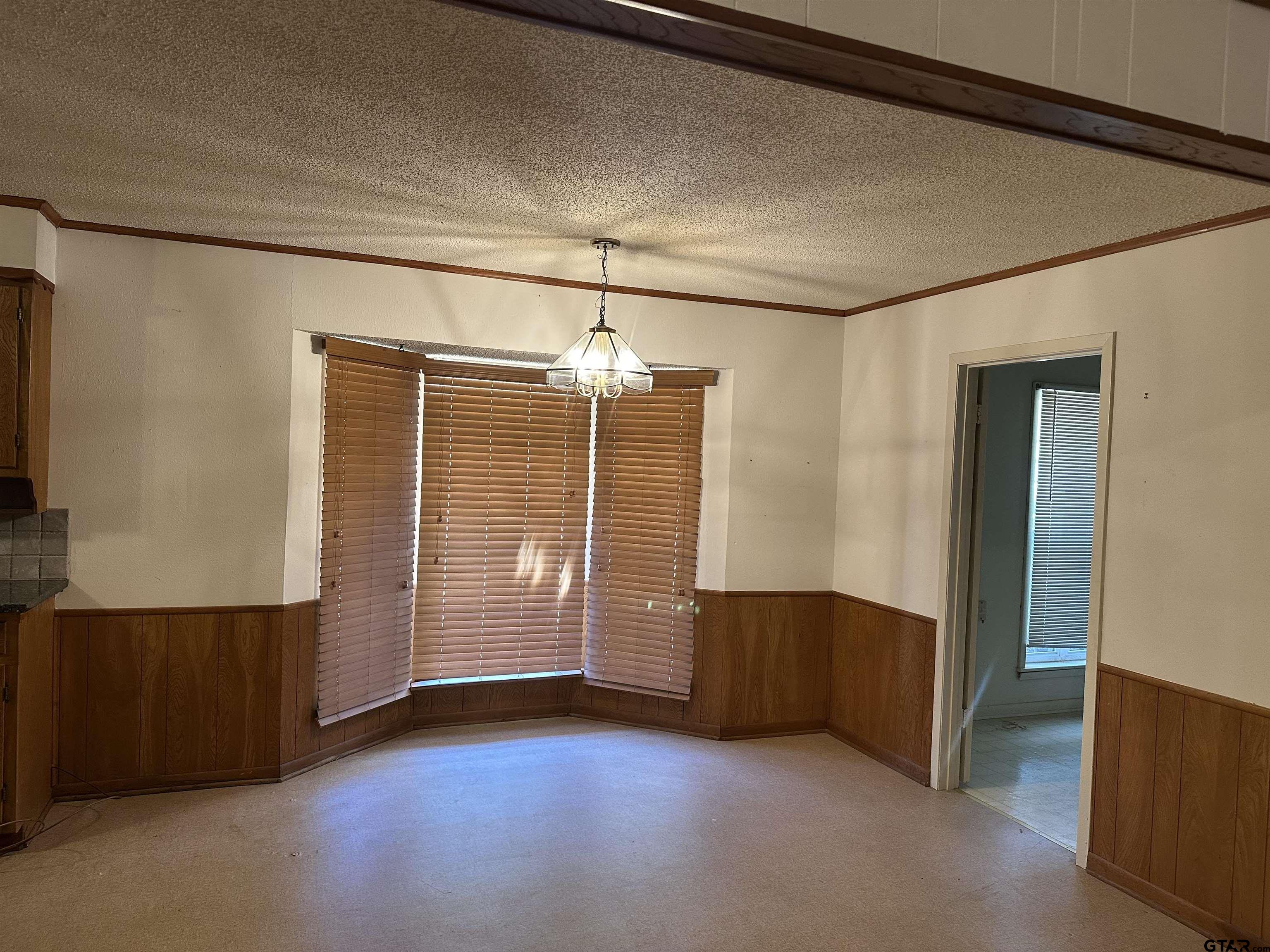 957 Farm To Market 23 Rusk, TX 75785 - Photo 9 of 25 a view of an empty room with a window