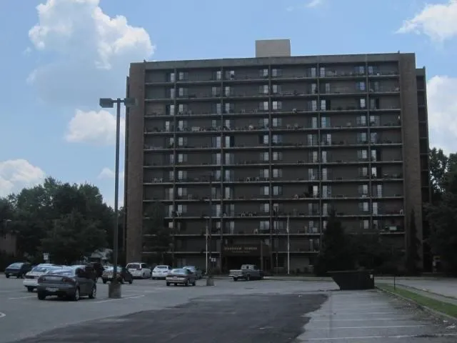 a front view of a building with street view