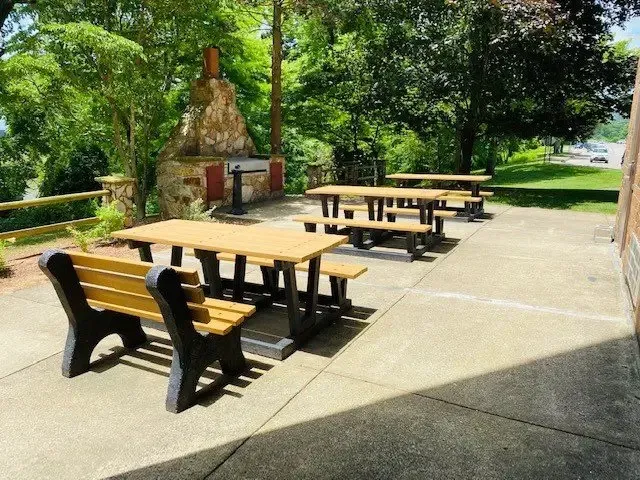 a kitchen with a refrigerator sink and cabinets