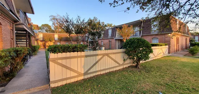 a view of swimming pool with a patio