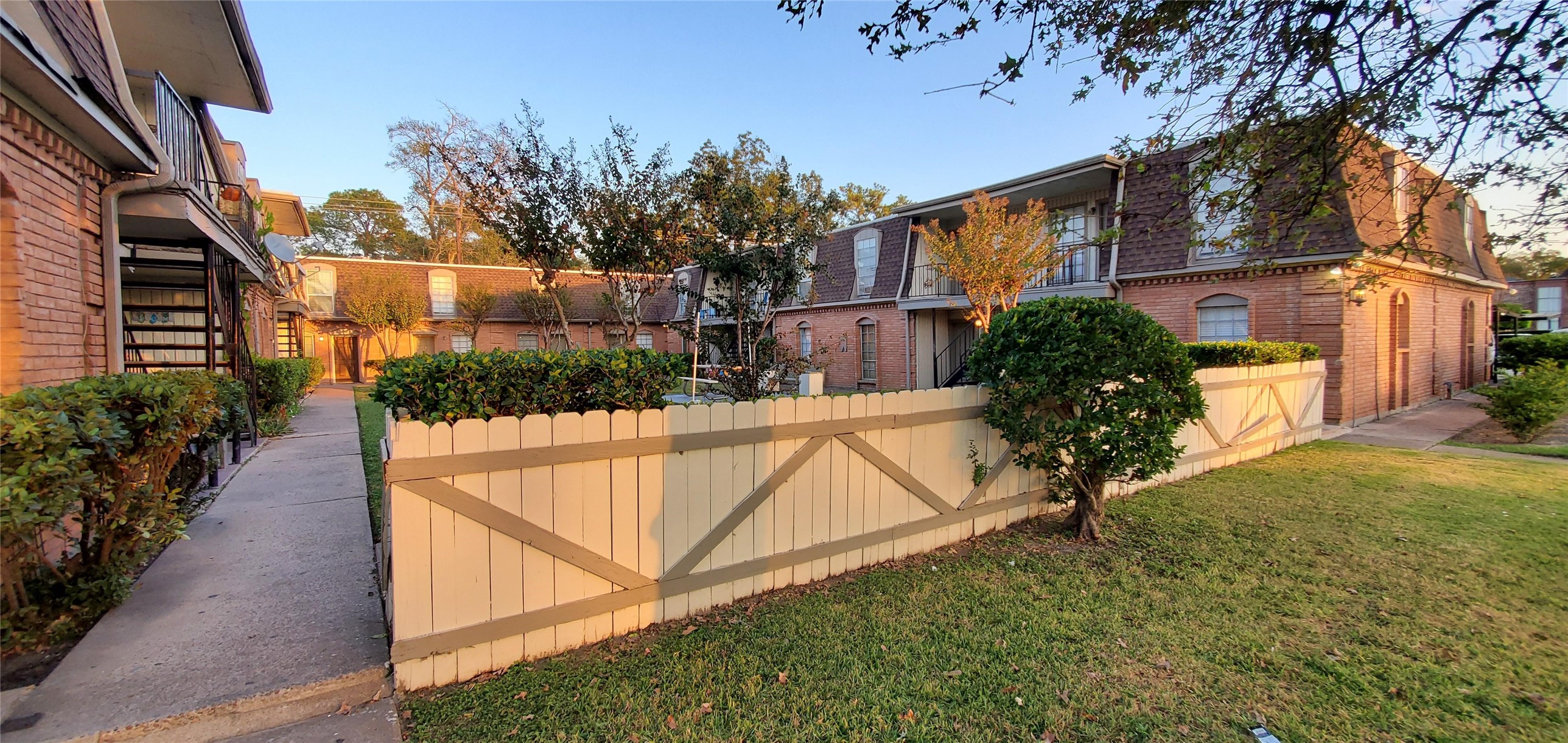 a view of swimming pool with a patio