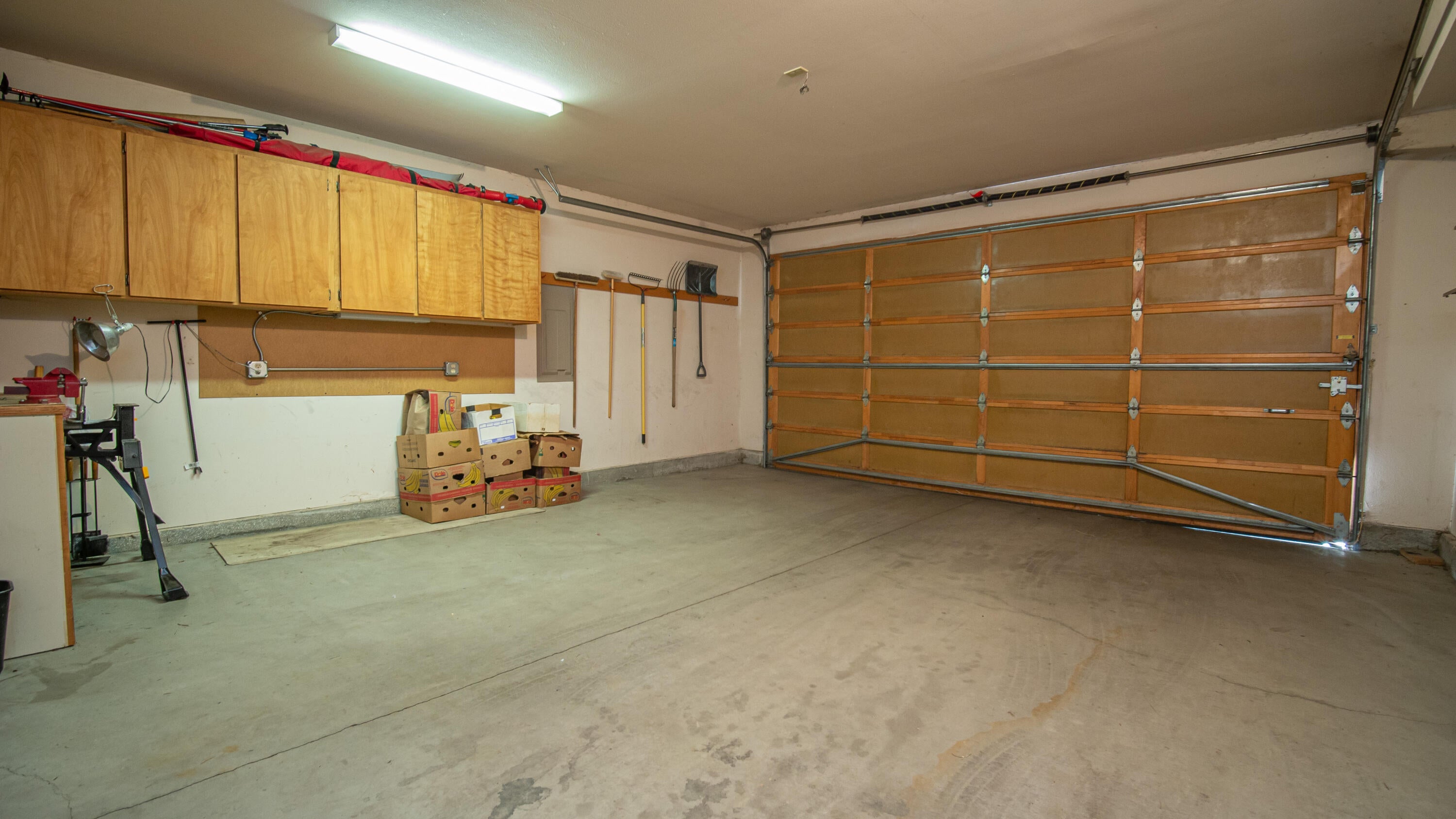 17932 Rhododendron Lane Sunriver, OR 97707 - Photo 31 of 32 A two car garage has room for more "toys".