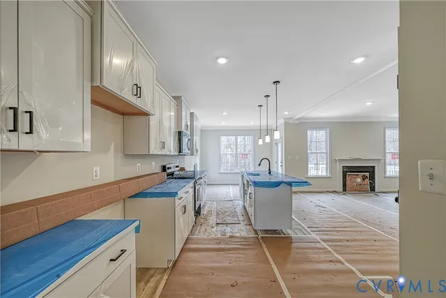 a very nice looking kitchen with a large window