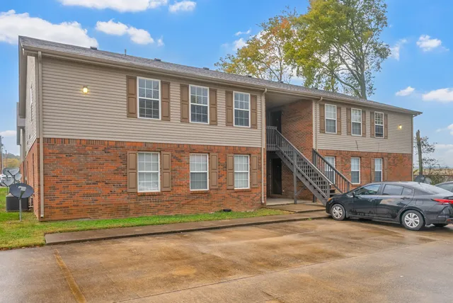 a car parked in front of a house