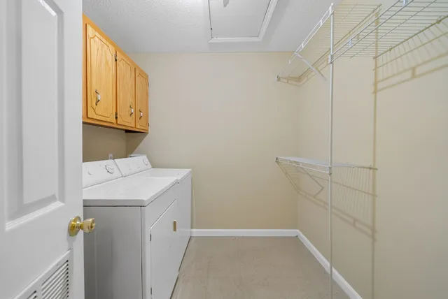 a bathroom with a sink a mirror and shower