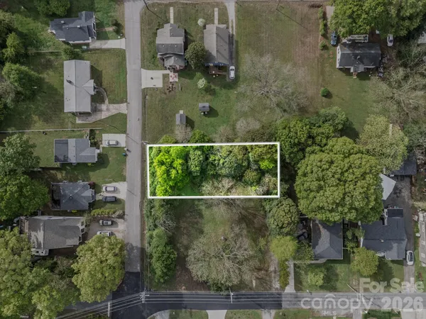 an aerial view of residential house with outdoor space