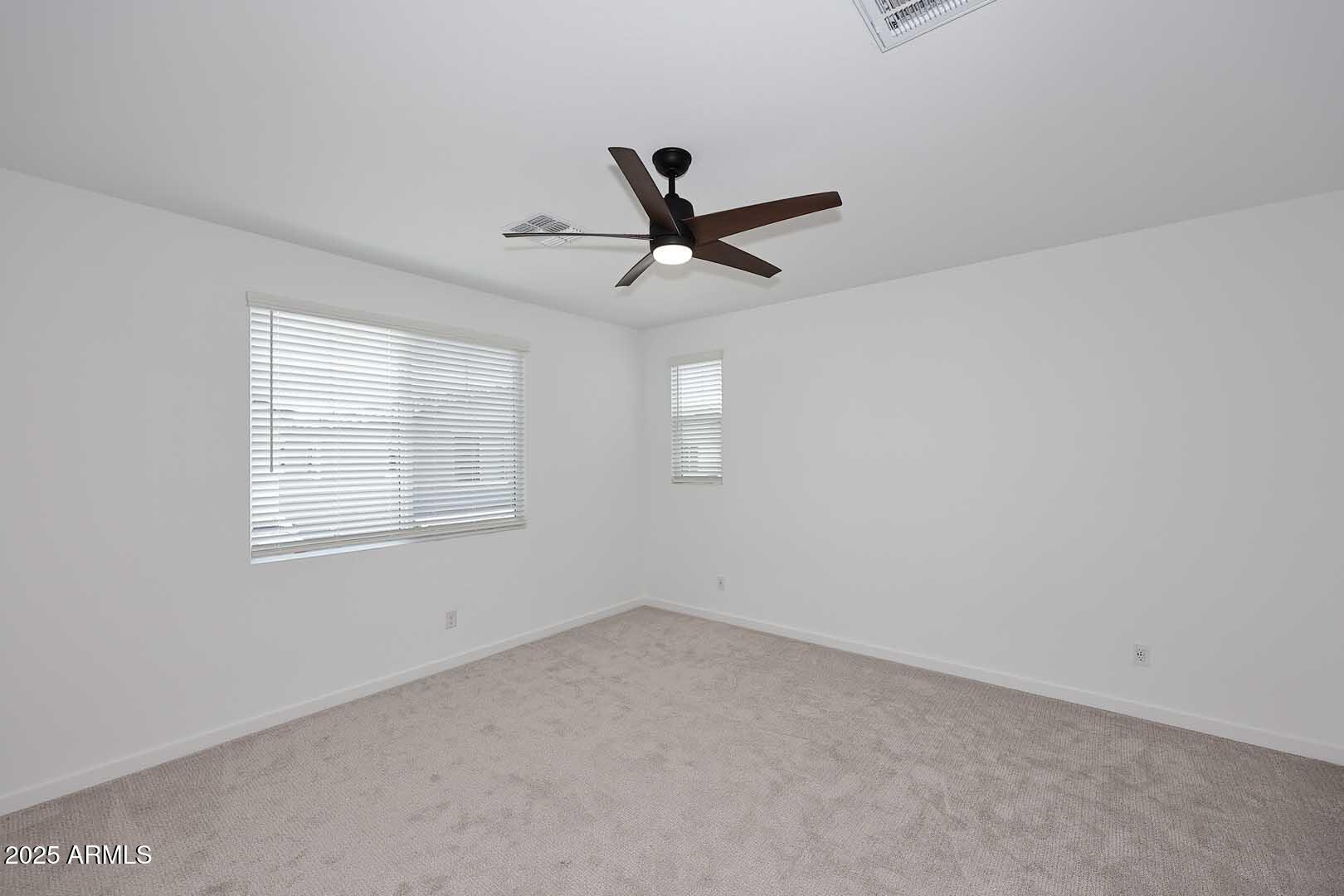 2442 West Rowel Road Phoenix, AZ 85085 - Photo 21 of 55 an empty room