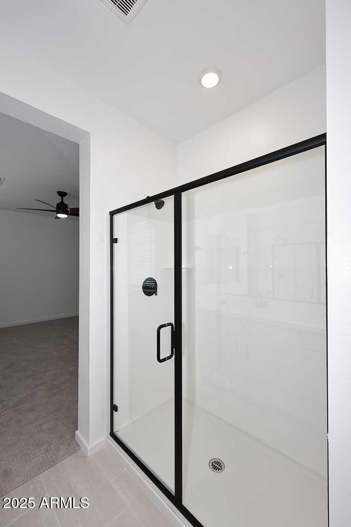 2442 West Rowel Road Phoenix, AZ 85085 - Photo 25 of 55 a bathroom with a glass shower door