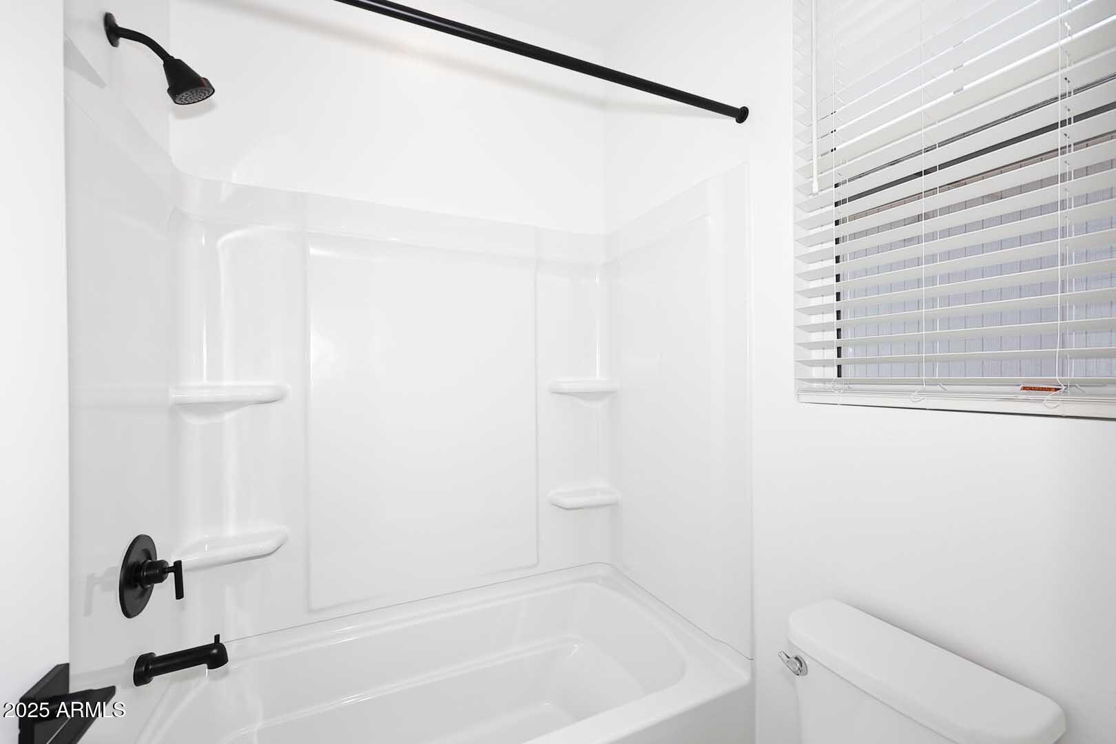 2442 West Rowel Road Phoenix, AZ 85085 - Photo 35 of 55 a bathroom with a shower