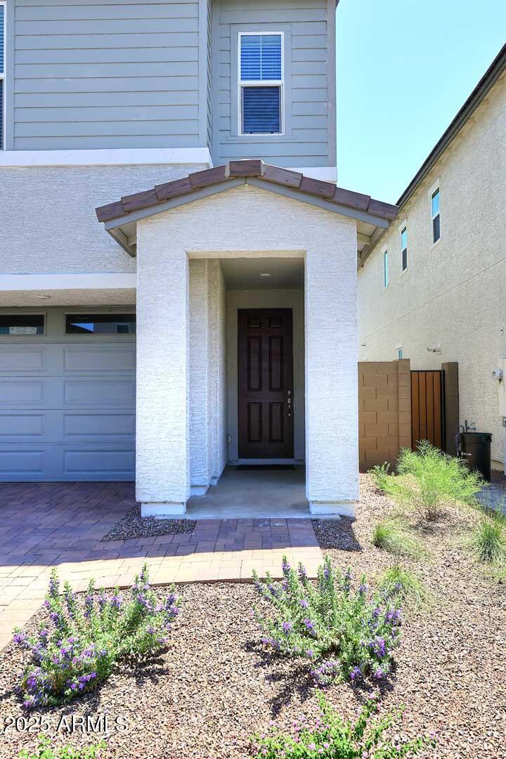 2442 West Rowel Road Phoenix, AZ 85085 - Photo 3 of 55 a view of a house with a yard