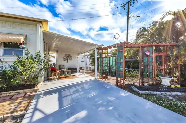 a view of a building with sitting area