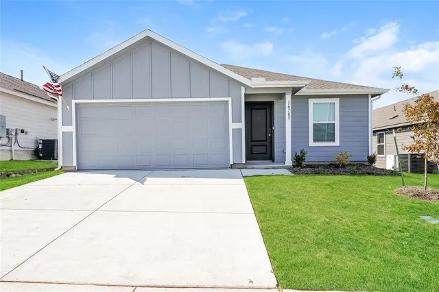 front view of house with a yard