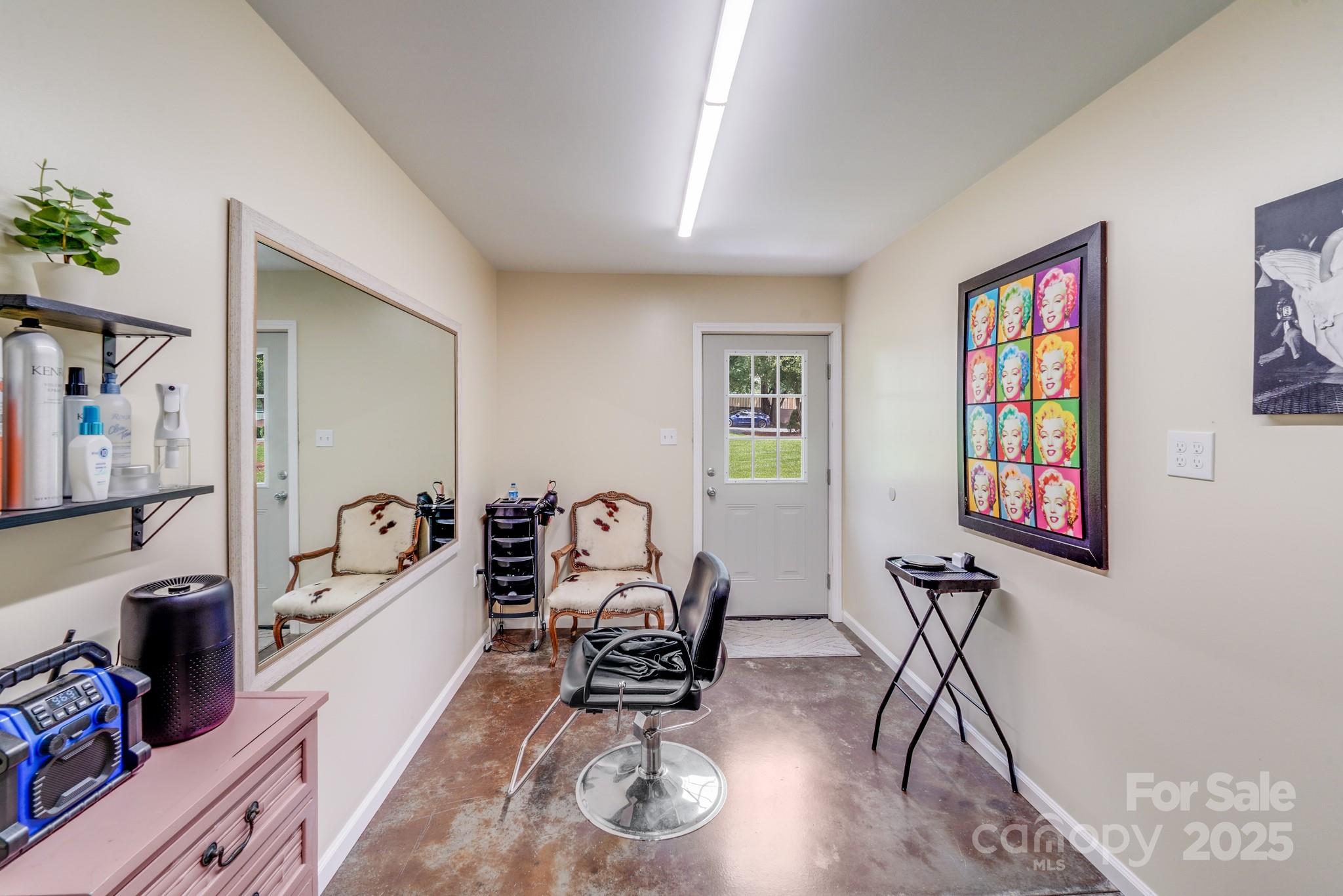 211 Drive Inn Road Locust, NC 28097 - Photo 25 of 48 a view of a livingroom with furniture and a flat screen tv