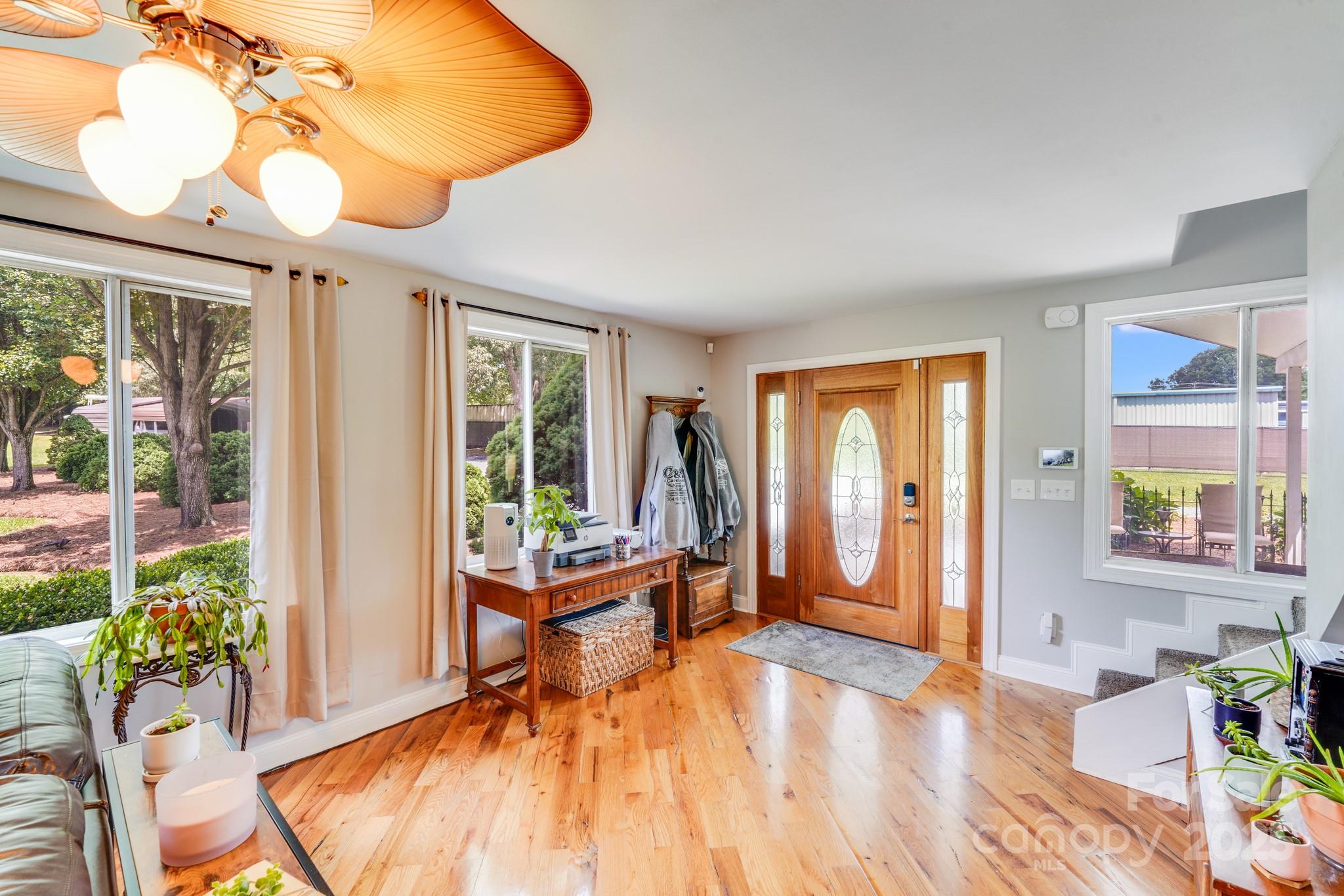 211 Drive Inn Road Locust, NC 28097 - Photo 29 of 48 a view of a livingroom with furniture window and wooden floor