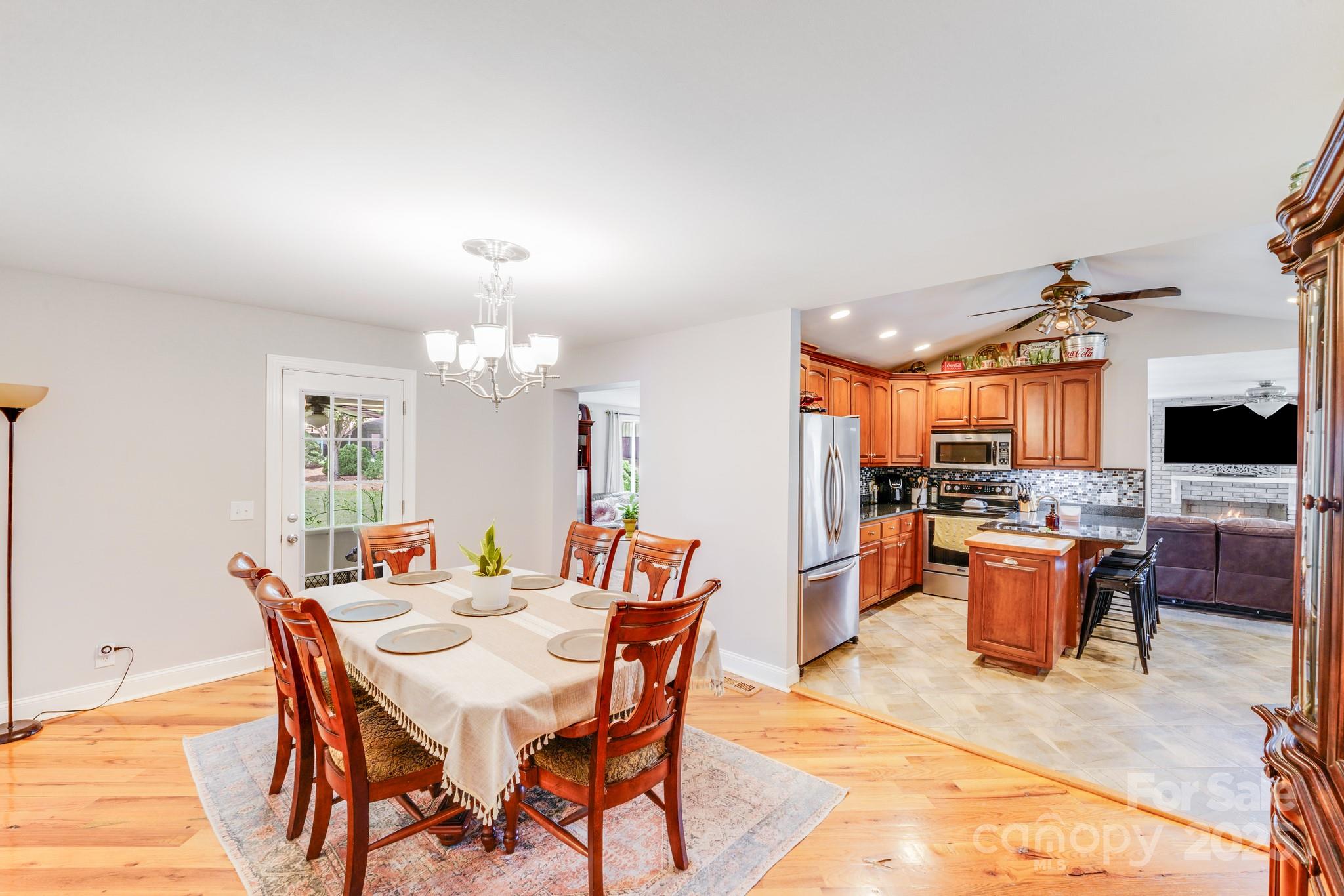 211 Drive Inn Road Locust, NC 28097 - Photo 34 of 48 a view of a dining room with furniture