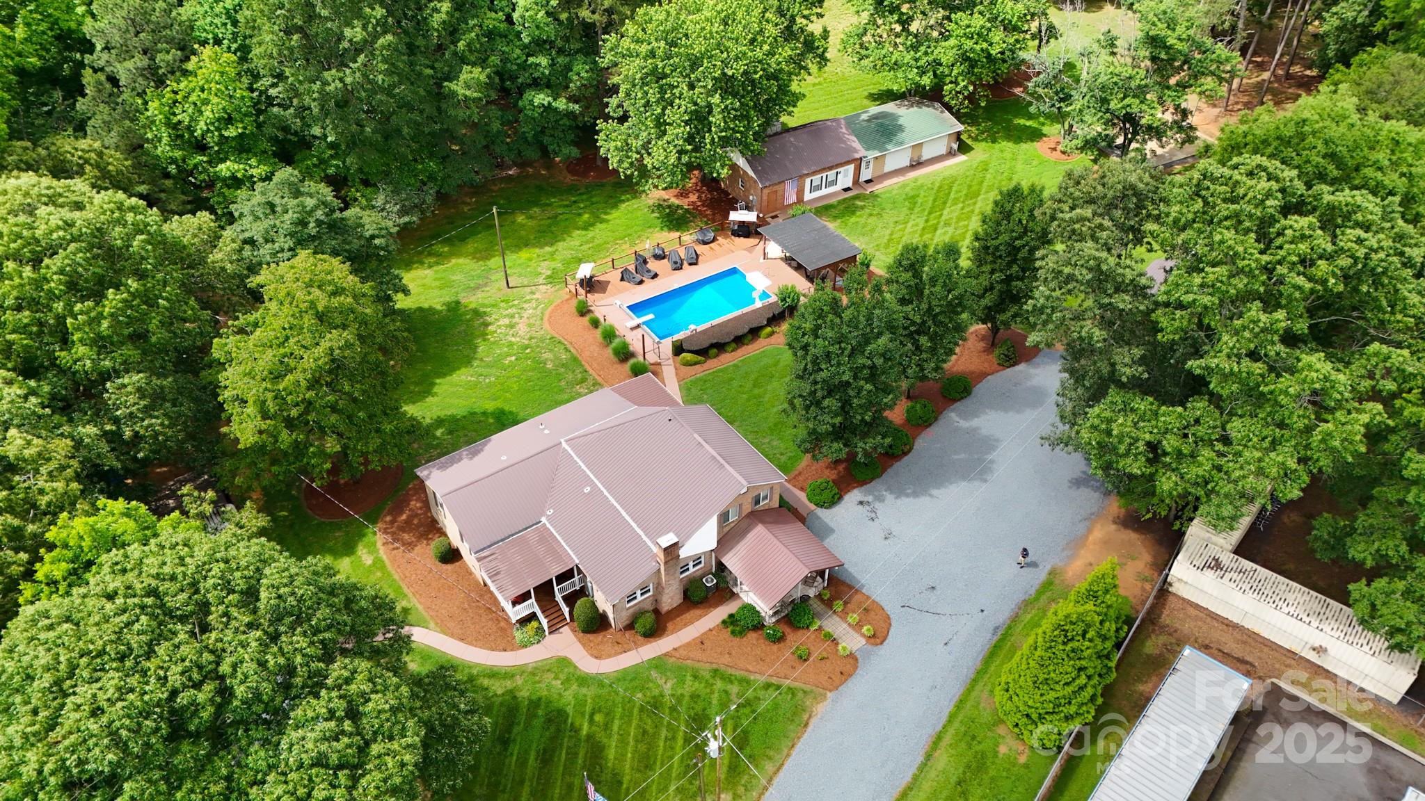 211 Drive Inn Road Locust, NC 28097 - Photo 7 of 48 an aerial view of a house with garden space and street view