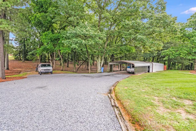 a childrens park with large trees