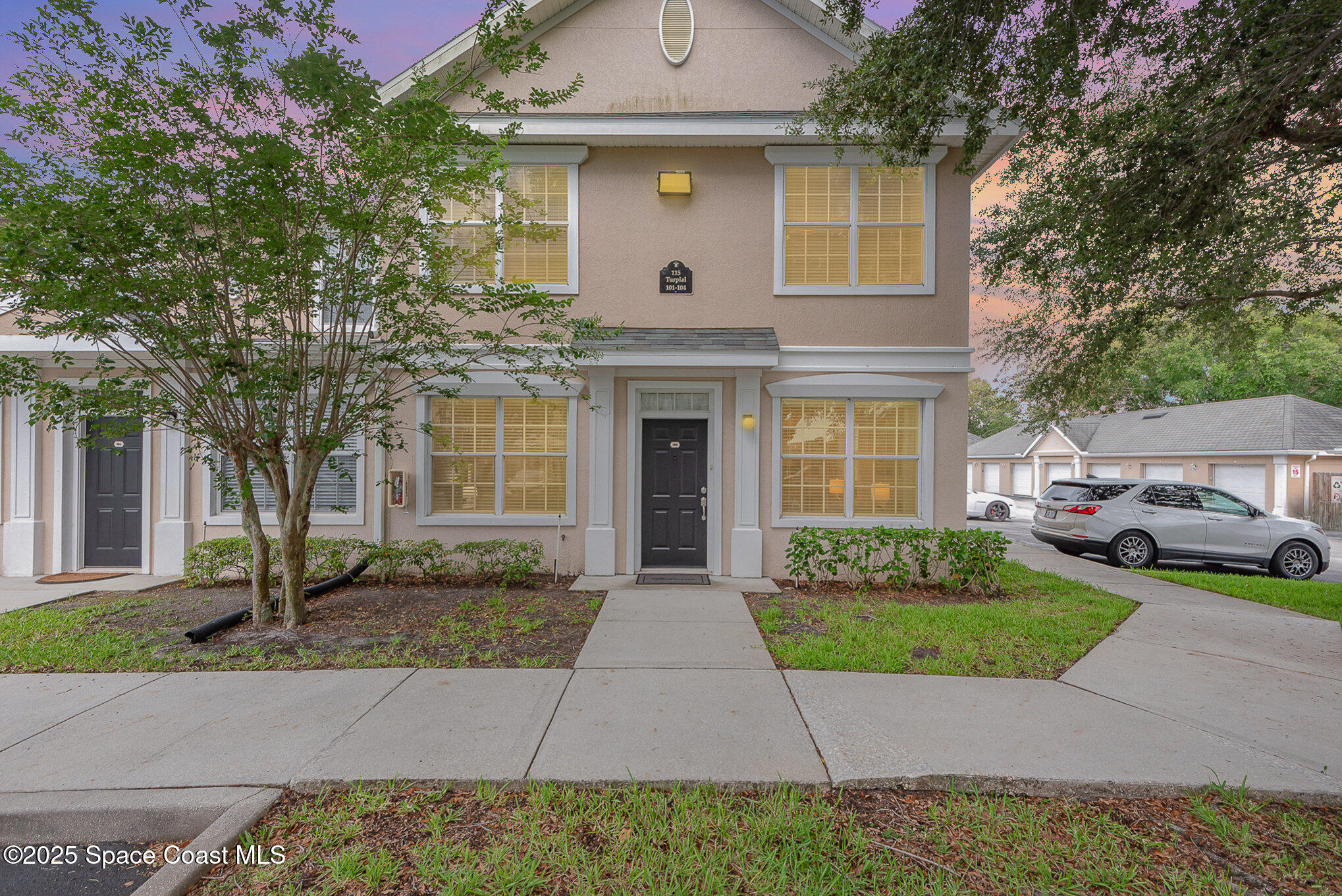 115 Turpial Way, Unit 104 Melbourne, FL 32901 - Photo 1 of 29 Front of Home