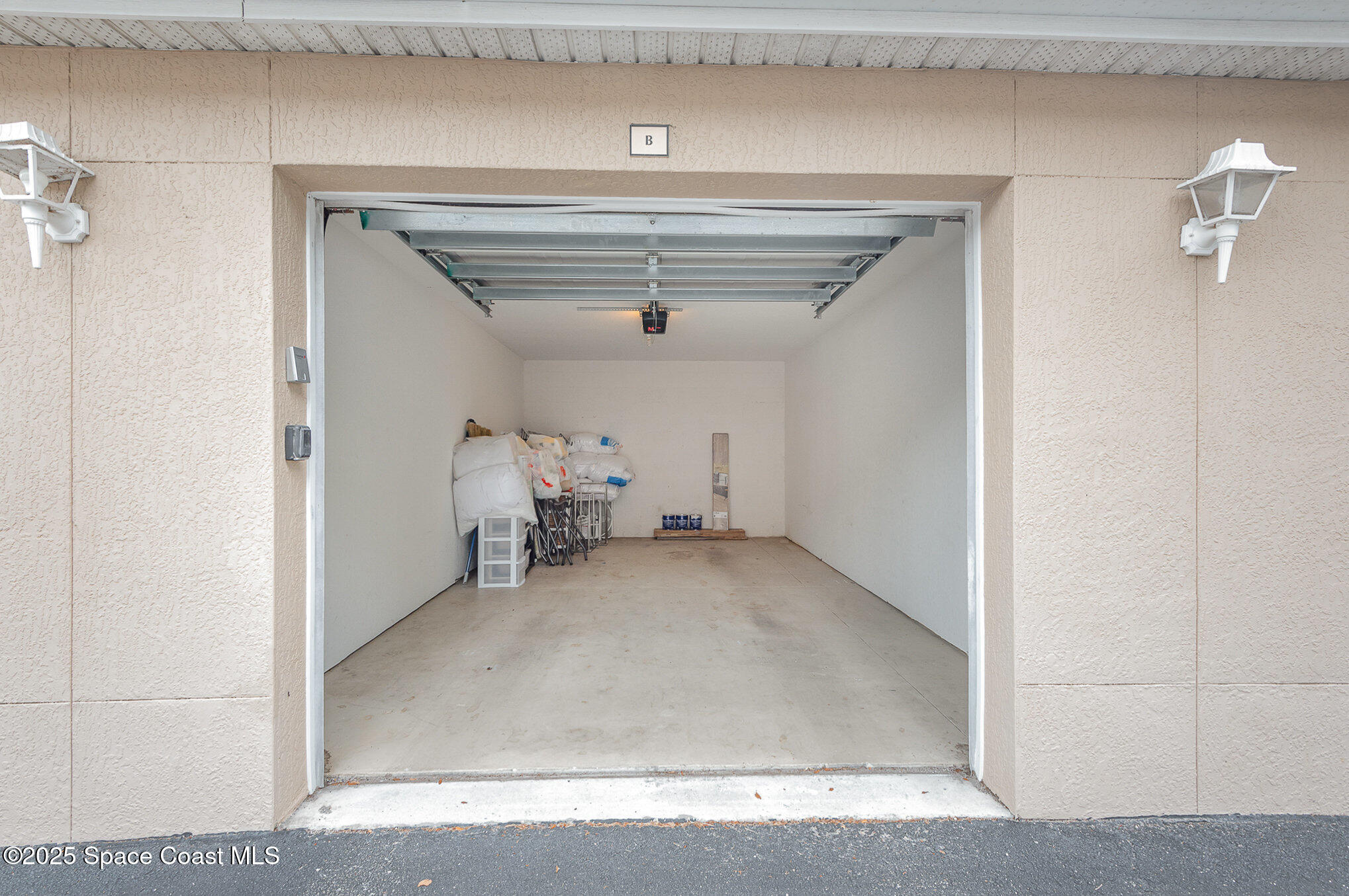 115 Turpial Way, Unit 104 Melbourne, FL 32901 - Photo 23 of 29 Deep and Private Single Car Garage