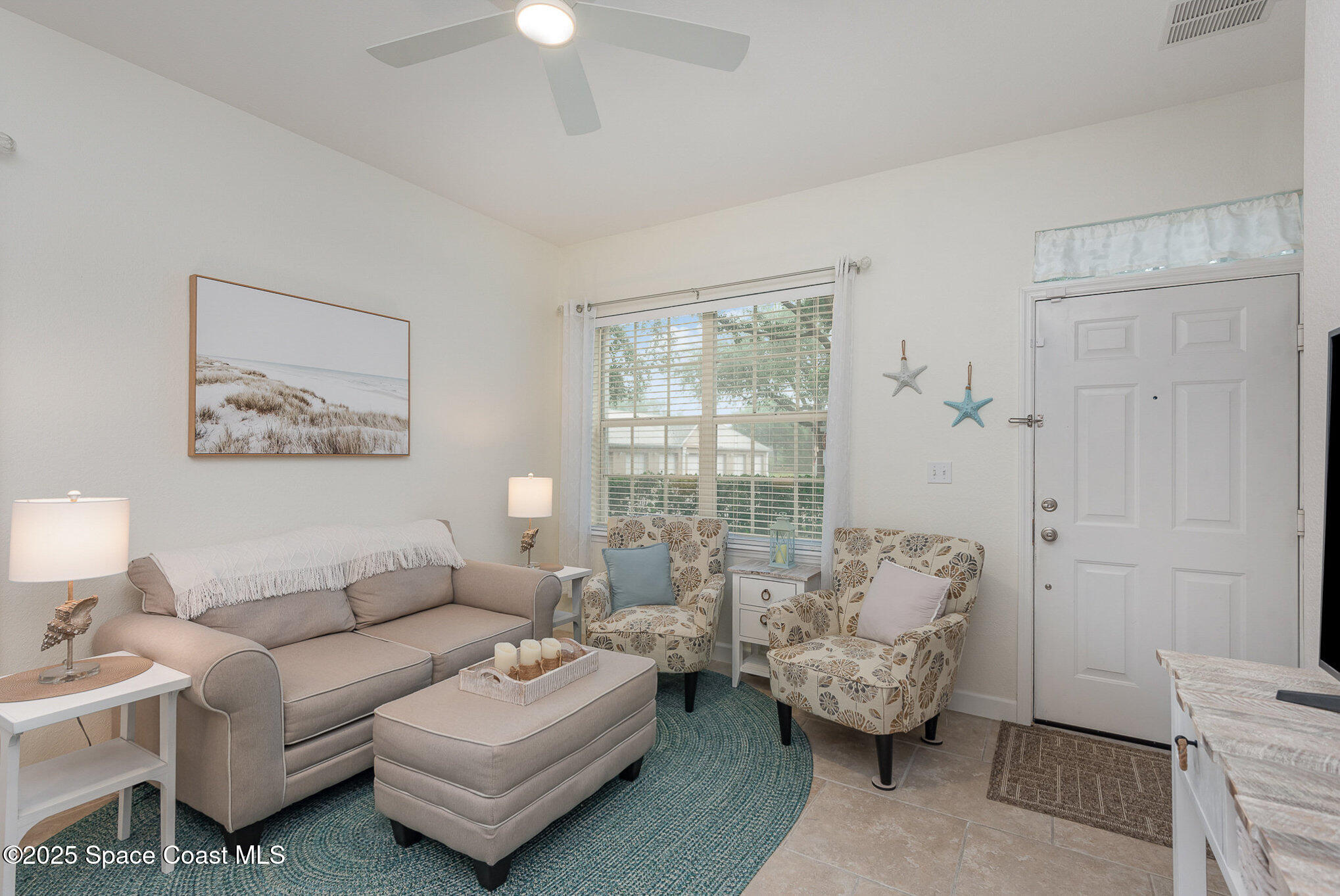 115 Turpial Way, Unit 104 Melbourne, FL 32901 - Photo 3 of 29 Living Room