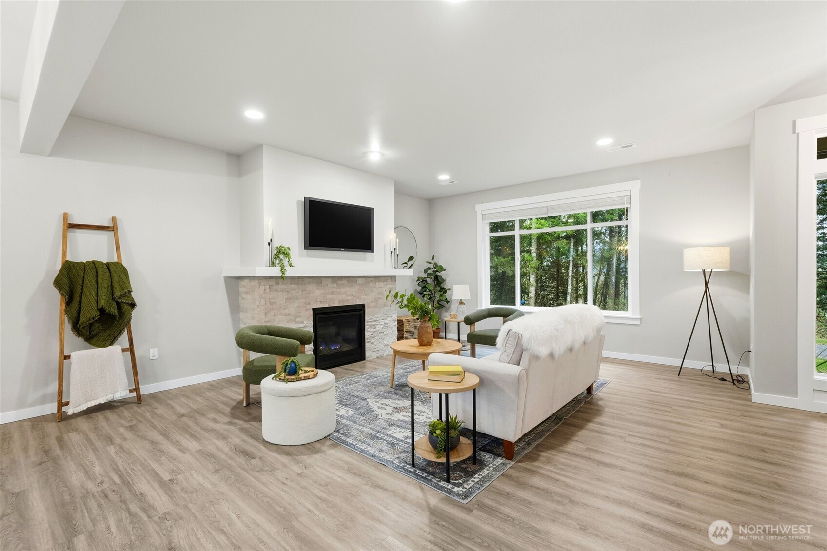 37311 142nd Place Southeast Sultan, WA 98294 - Photo 2 of 35 a living room with furniture and a fireplace