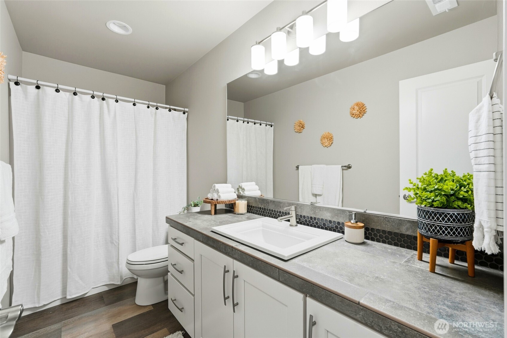 37311 142nd Place Southeast Sultan, WA 98294 - Photo 21 of 35 a bathroom with a sink double vanity and a mirror
