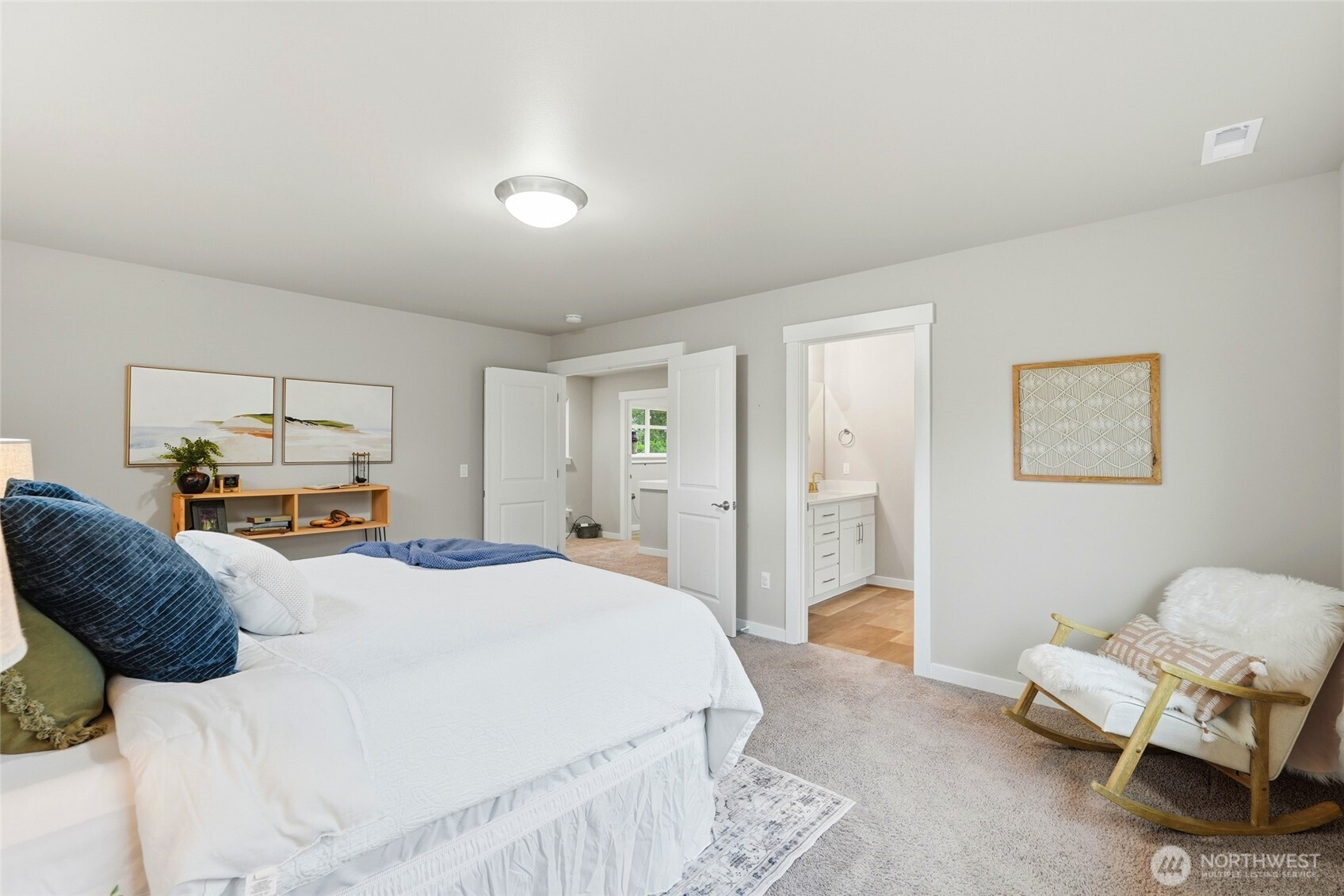 37311 142nd Place Southeast Sultan, WA 98294 - Photo 22 of 35 a bedroom with a bed and a chair