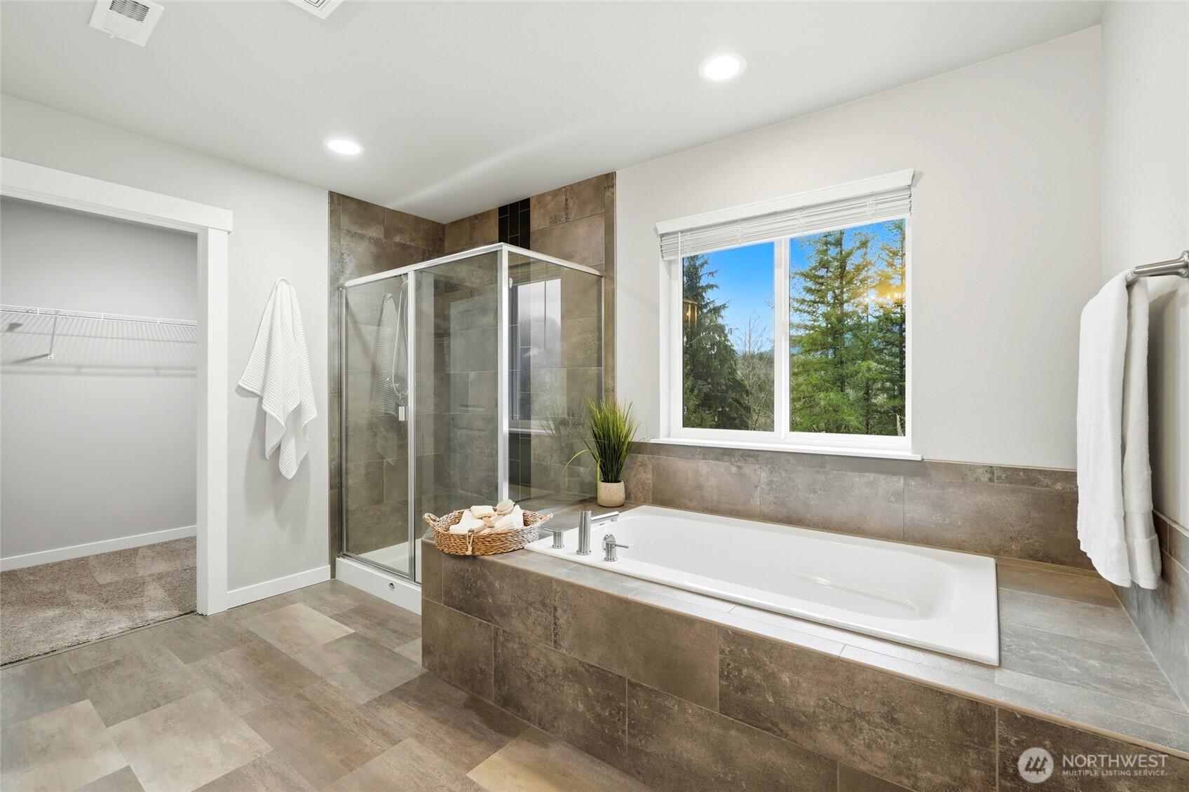 37311 142nd Place Southeast Sultan, WA 98294 - Photo 24 of 35 a spacious bathroom with a tub shower and sink