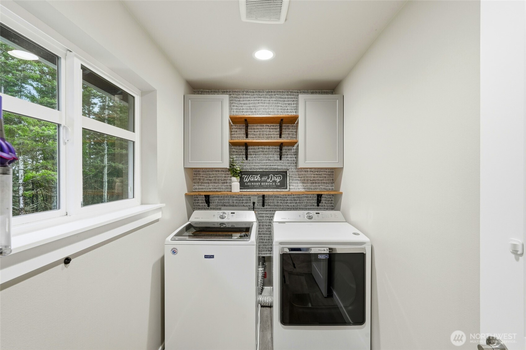 37311 142nd Place Southeast Sultan, WA 98294 - Photo 26 of 35 a kitchen with a sink stove and cabinets