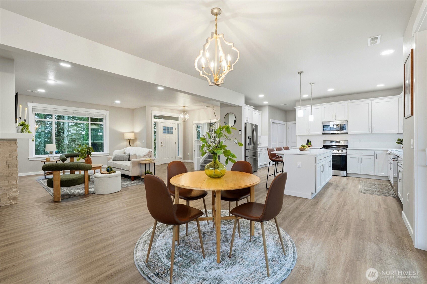 37311 142nd Place Southeast Sultan, WA 98294 - Photo 3 of 35 a view of a dining room with furniture window and wooden floor