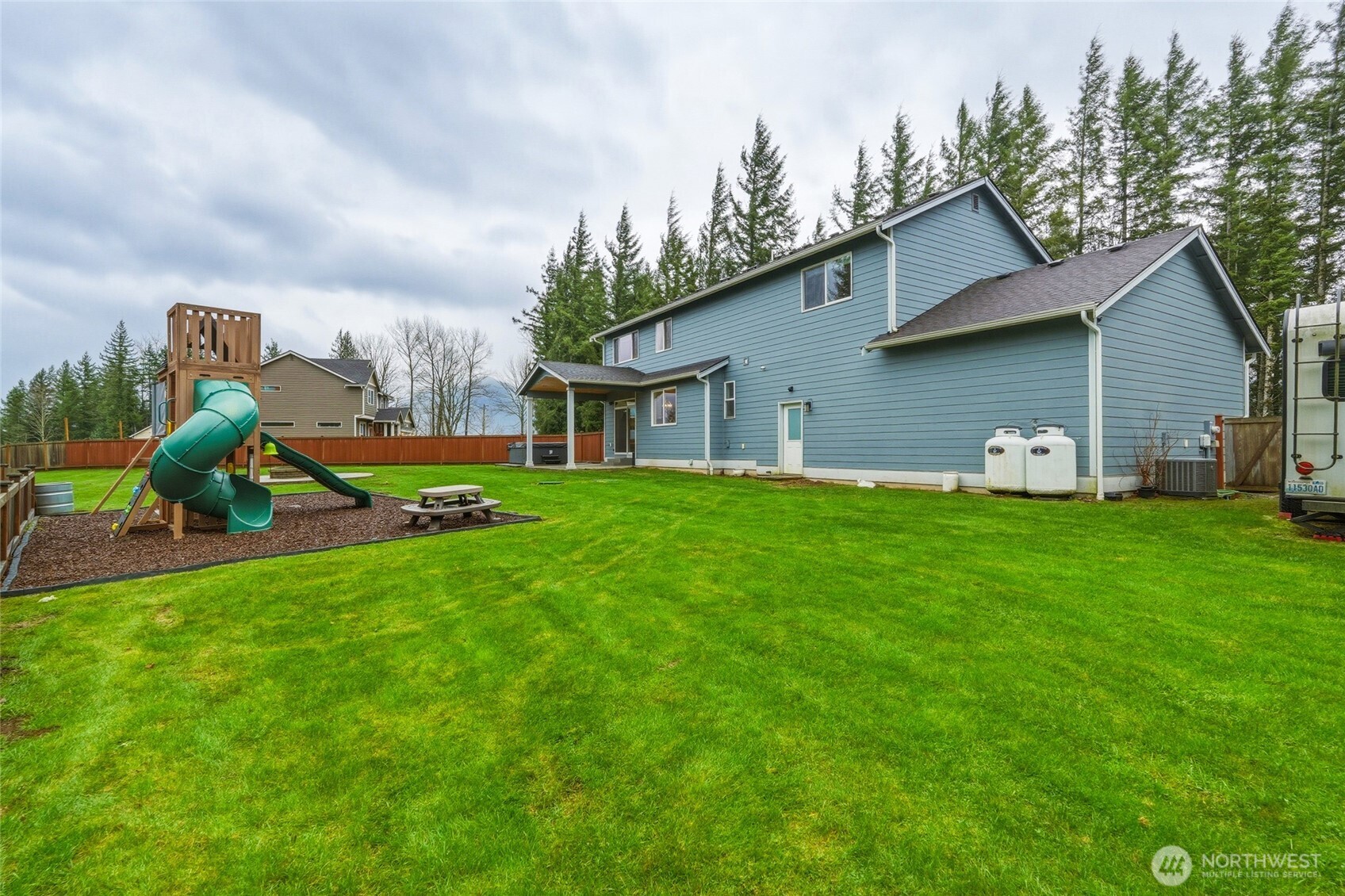 37311 142nd Place Southeast Sultan, WA 98294 - Photo 32 of 35 a house view with a garden space