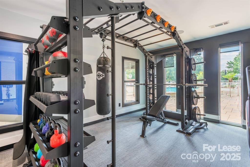 902 West 4th Street, Unit CEDAR Charlotte, NC 28202 - Photo 16 of 24 a view of a room with gym equipment