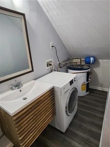 a utility room with dryer and washer