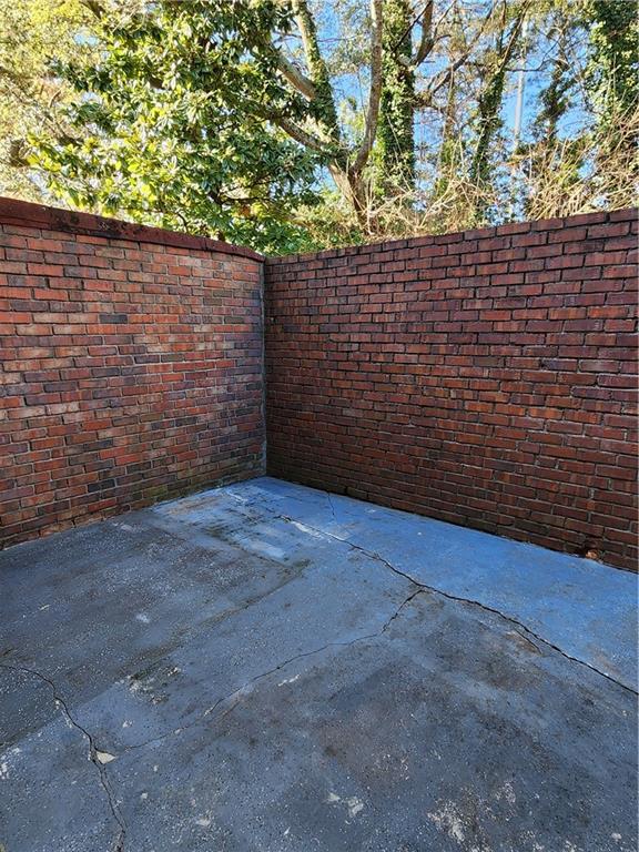 3543 Old Chamblee Tucker Road, Unit D Atlanta, GA 30340 - Photo 22 of 22 a view of a wooden door and trees