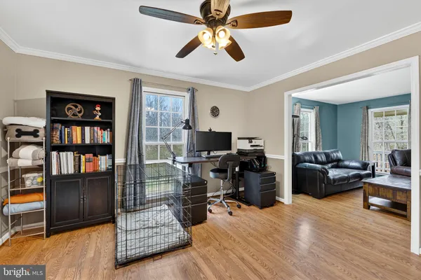 a workspace with furniture and window