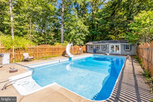 a view of a back yard of the house