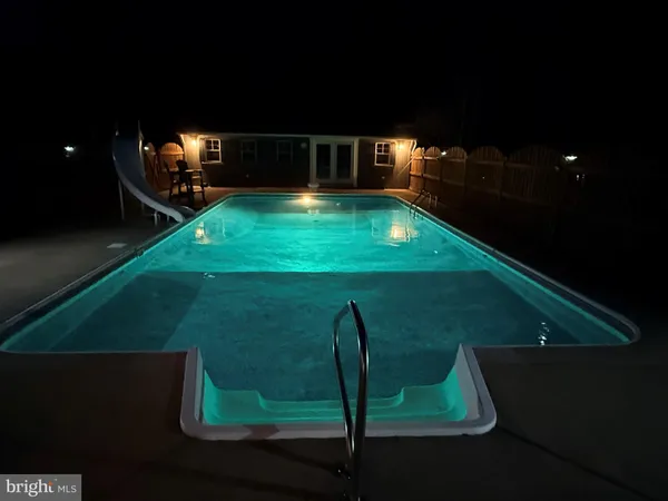 a room with furniture and a window