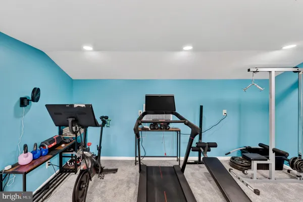 a view of a room with gym equipment