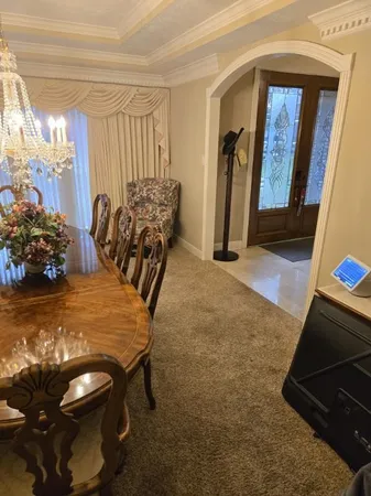 a view of a livingroom with furniture and window