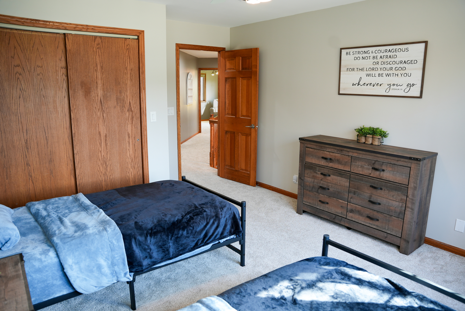 19410 Timber Drive North Elwood, IL 60421 - Photo 19 of 26 a living room with a bed and dresser