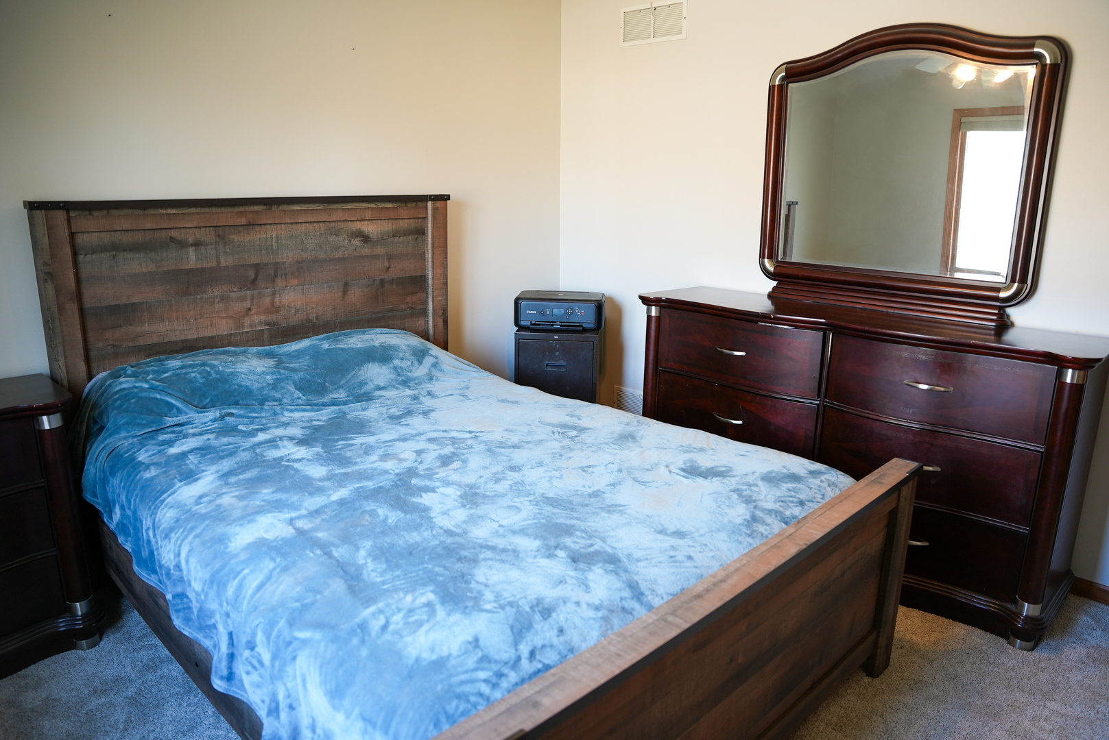 19410 Timber Drive North Elwood, IL 60421 - Photo 20 of 26 a room with a bed and mirror