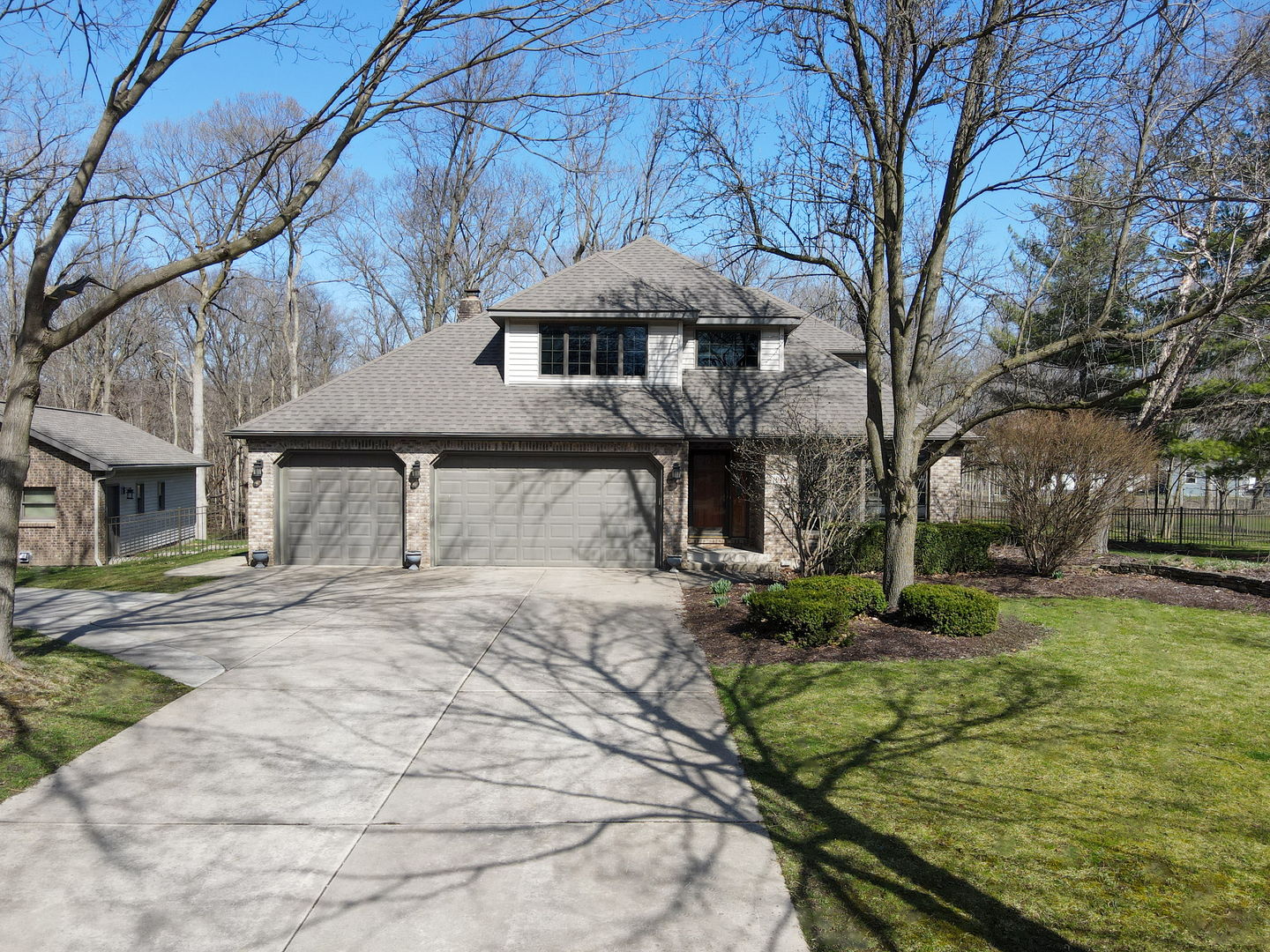 19410 Timber Drive North Elwood, IL 60421 - Photo 2 of 26 a front view of a house with garden