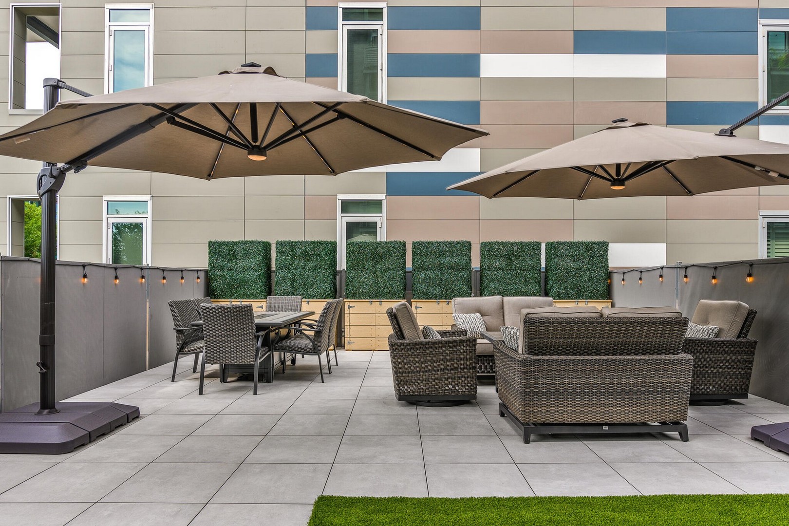 1100 West Adams Street, Unit 2N Chicago, IL 60607 - Photo 19 of 23 a patio with a table and chairs under an umbrella