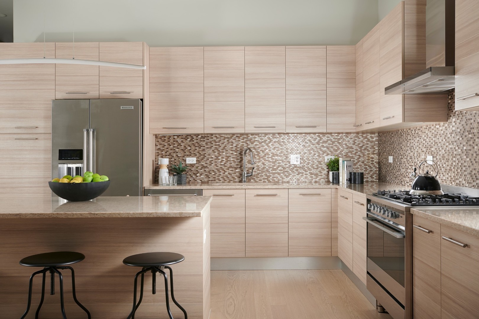 1100 West Adams Street, Unit 2N Chicago, IL 60607 - Photo 3 of 23 a kitchen with granite countertop a sink a stove and cabinets
