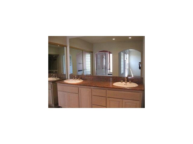 512 Hamilton Avenue Milpitas, CA 95035 - Photo 7 of 8 a bathroom with a sink double vanity and a mirror