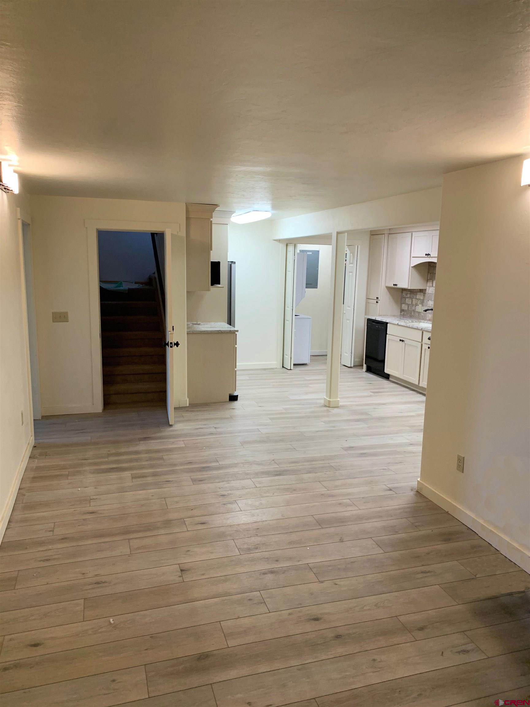 15967 Bull Mesa Road Cedaredge, CO 81413 - Photo 26 of 32 Lower Apartment Living/Kitchen